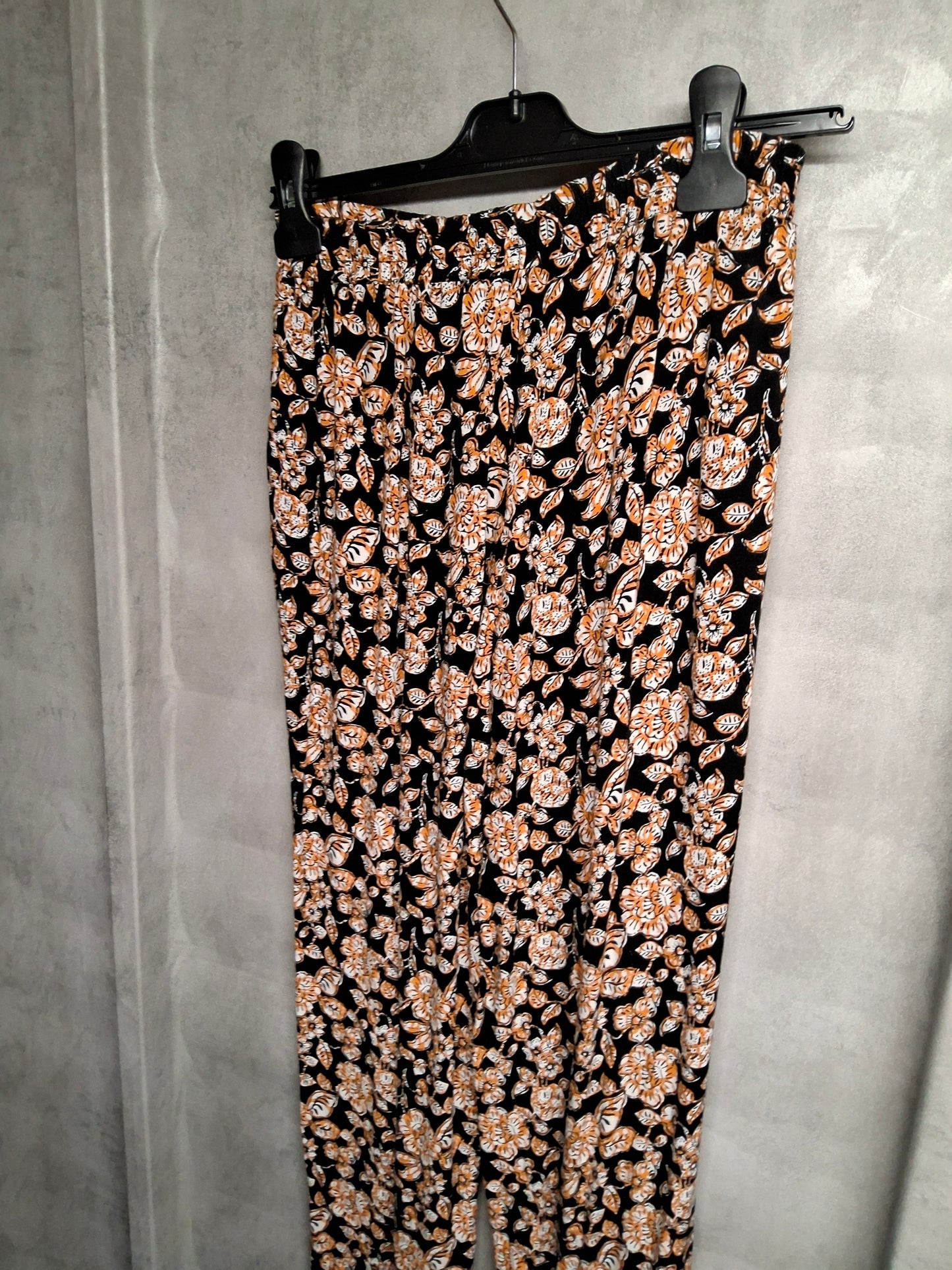Bold Black & Orange Floral Skinny Trousers – Size 8 | Comfy with Pockets