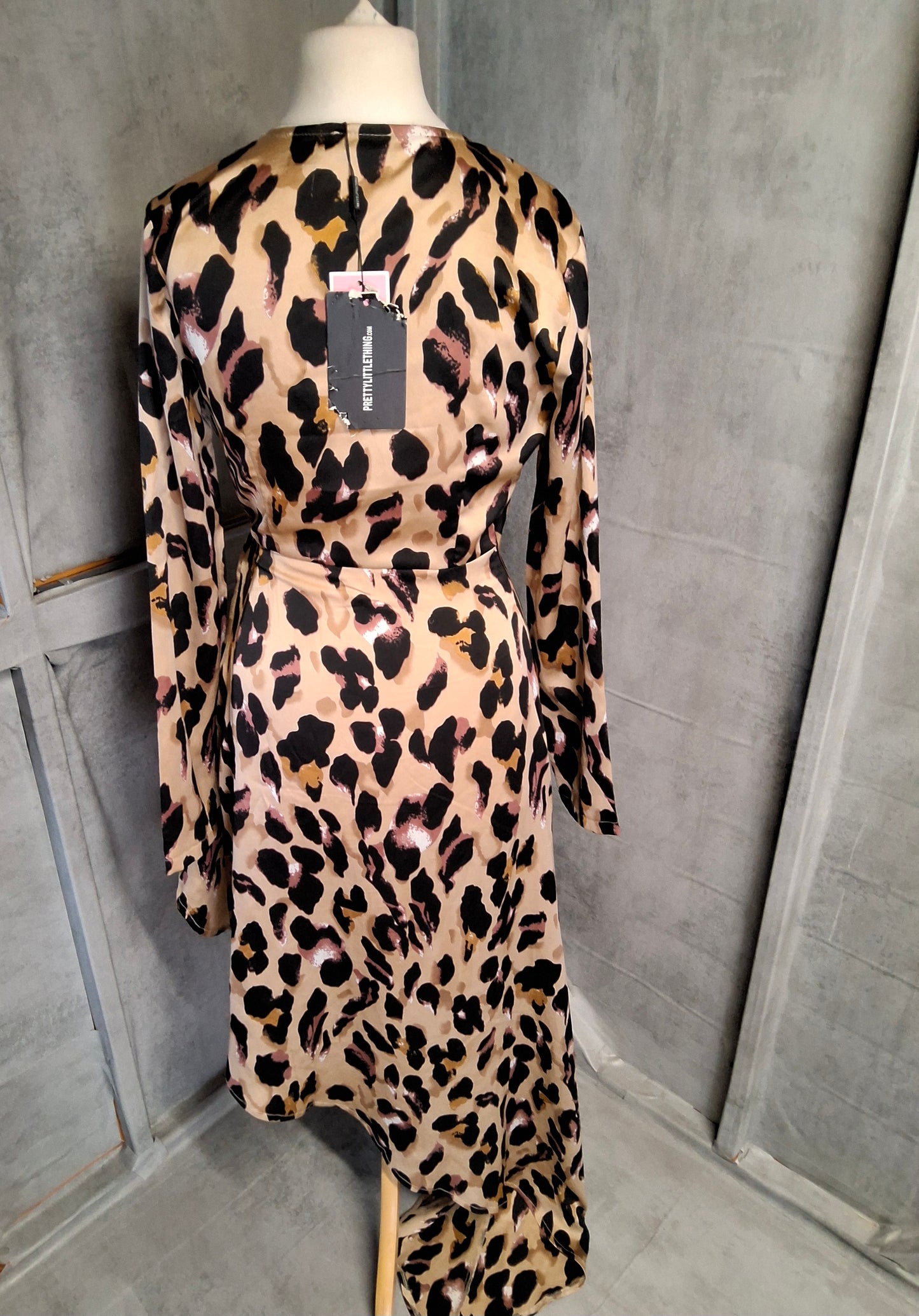 PLT Animal Print Asymmetrical Wrap Dress ā Size 8 ā Long Sleeves ā NWT