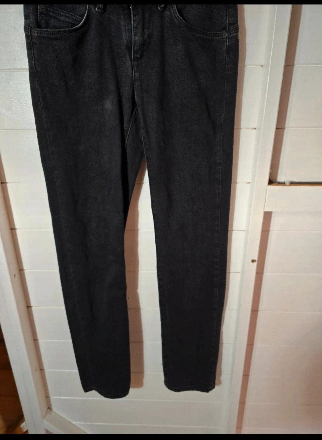 Calvin Klein black faded slim leg jeans W25"