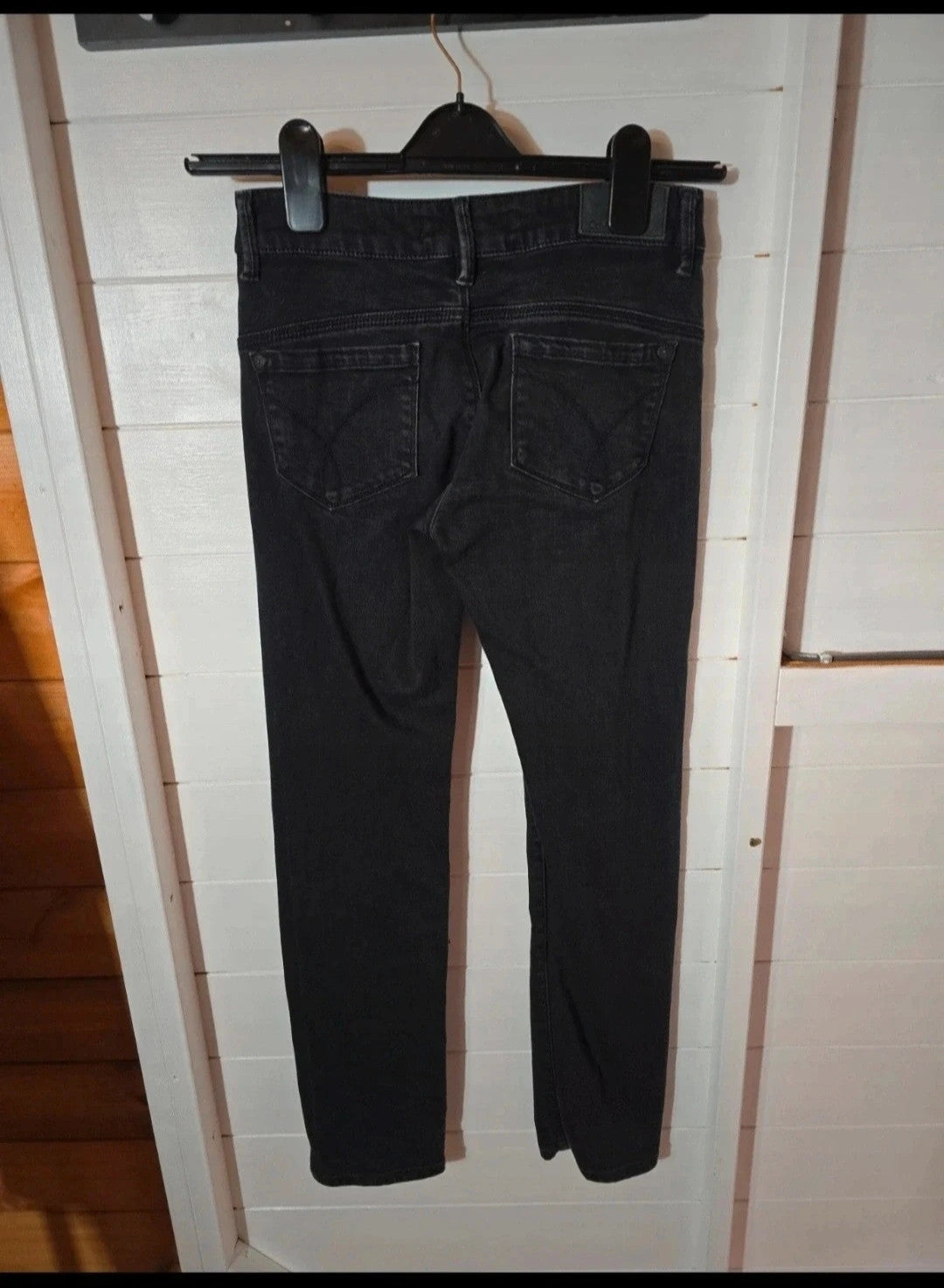 Calvin Klein black faded slim leg jeans W25"