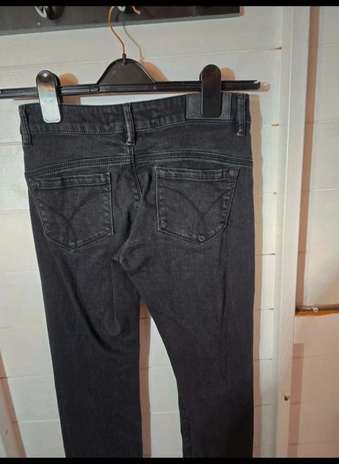 Calvin Klein black faded slim leg jeans W25"