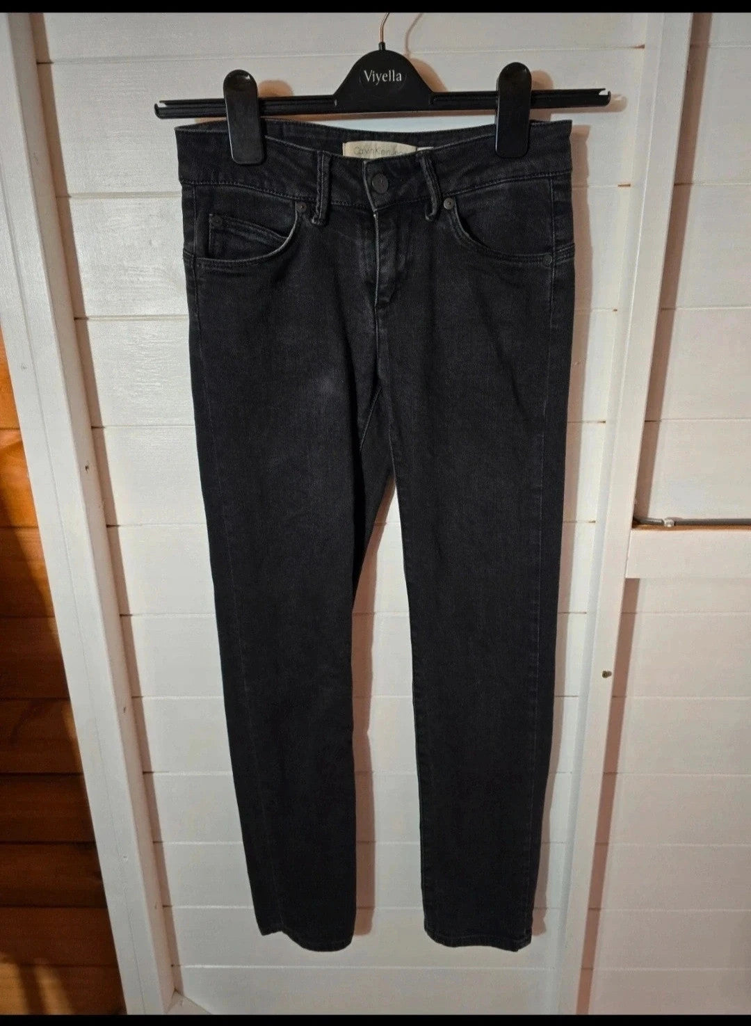 Calvin Klein black faded slim leg jeans W25"