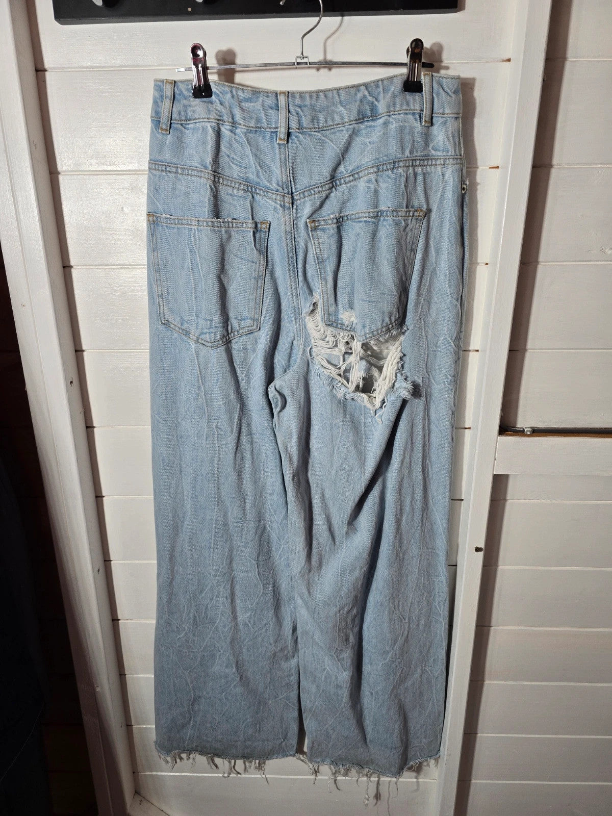 Ladie's Asos Denim light blue ripped distressed flared jeans 28" size 6/8