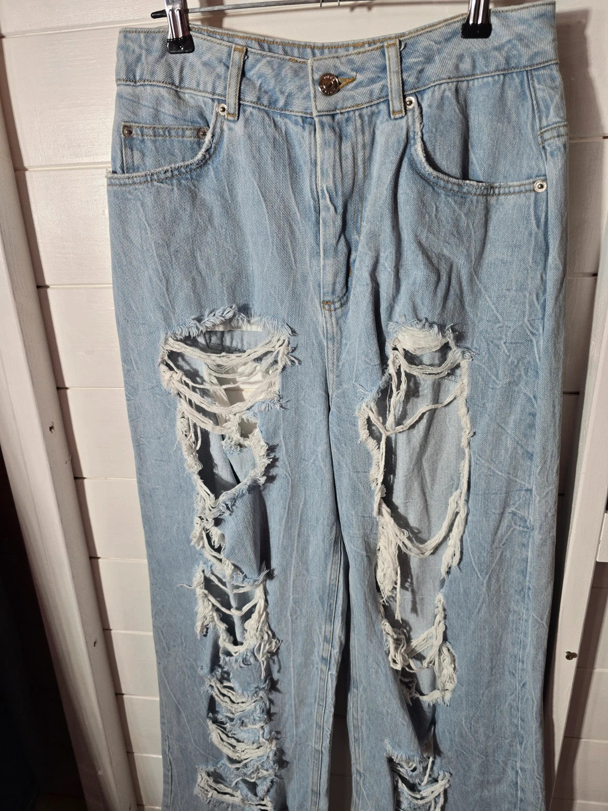 Ladie's Asos Denim light blue ripped distressed flared jeans 28" size 6/8