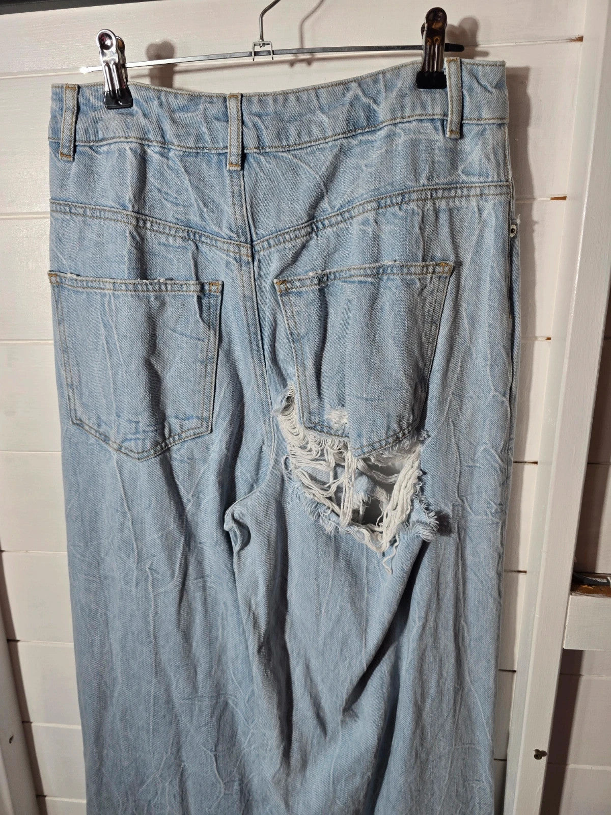 Ladie's Asos Denim light blue ripped distressed flared jeans 28" size 6/8