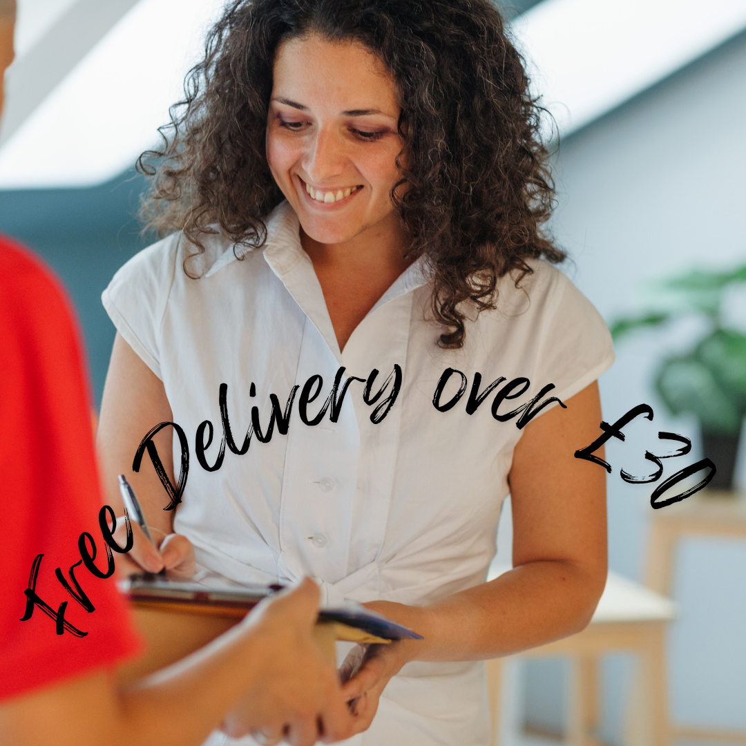 “Smiling woman signing delivery form – free delivery on orders over £30 UK”
