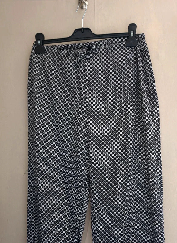 Closer by Evie Black & White Floral Patterned Flared Trousers Size 10-12