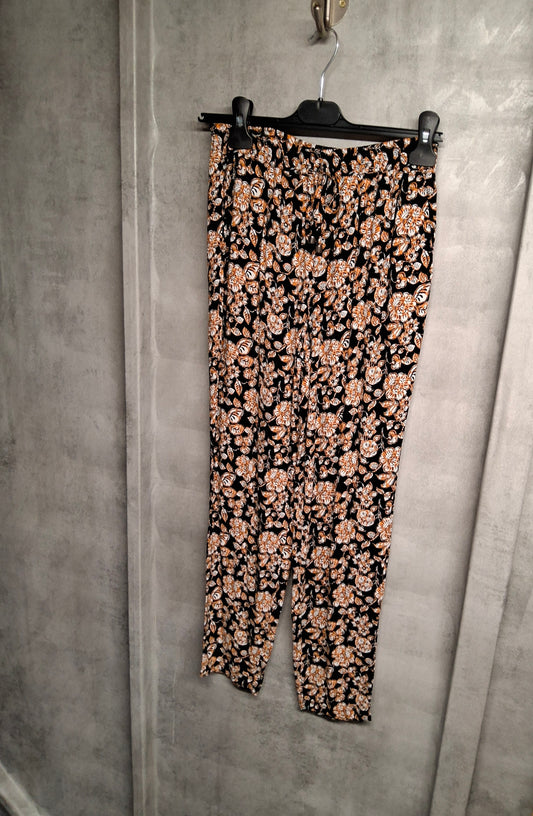 Bold Black & Orange Floral Skinny Trousers – Size 8 | Comfy with Pockets