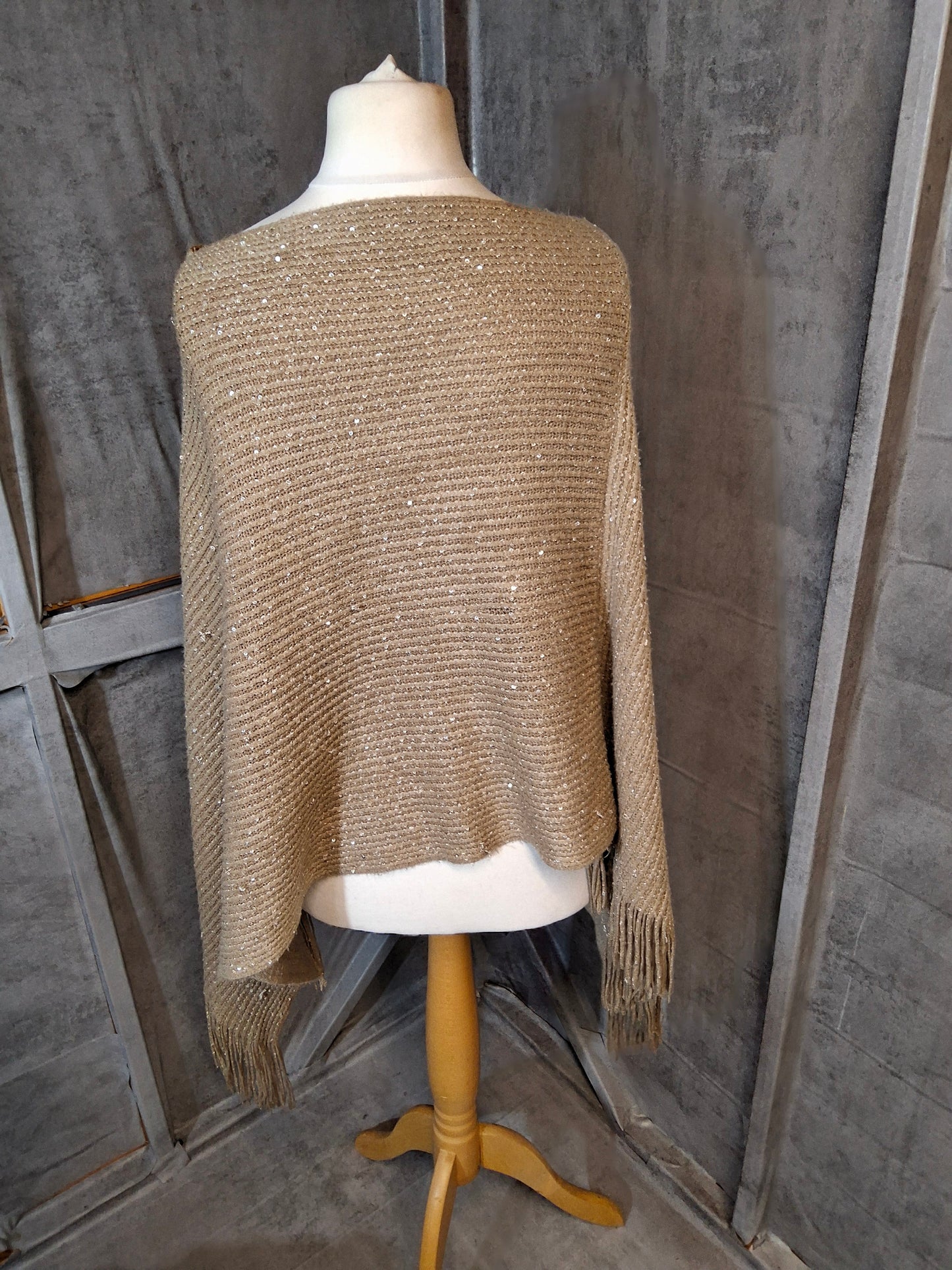 Beige Knitted Sequin Poncho with Tassel Trim – One Size (Fits size 12–18)