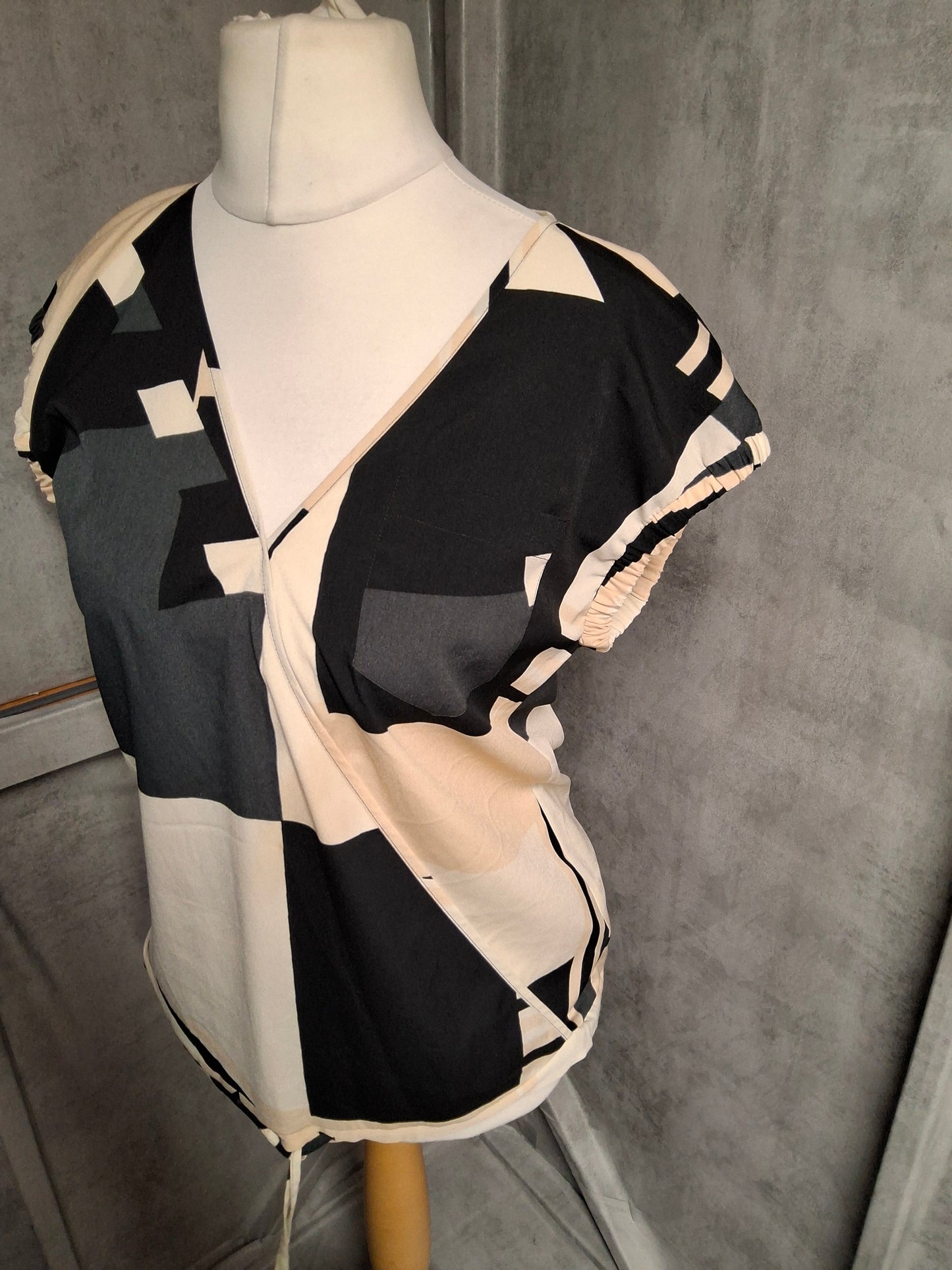 Next Monochrome Geometric Wrap-Style Top – Size 8 – Abstract Print with Ruched Sleeves & Drawstring Hem