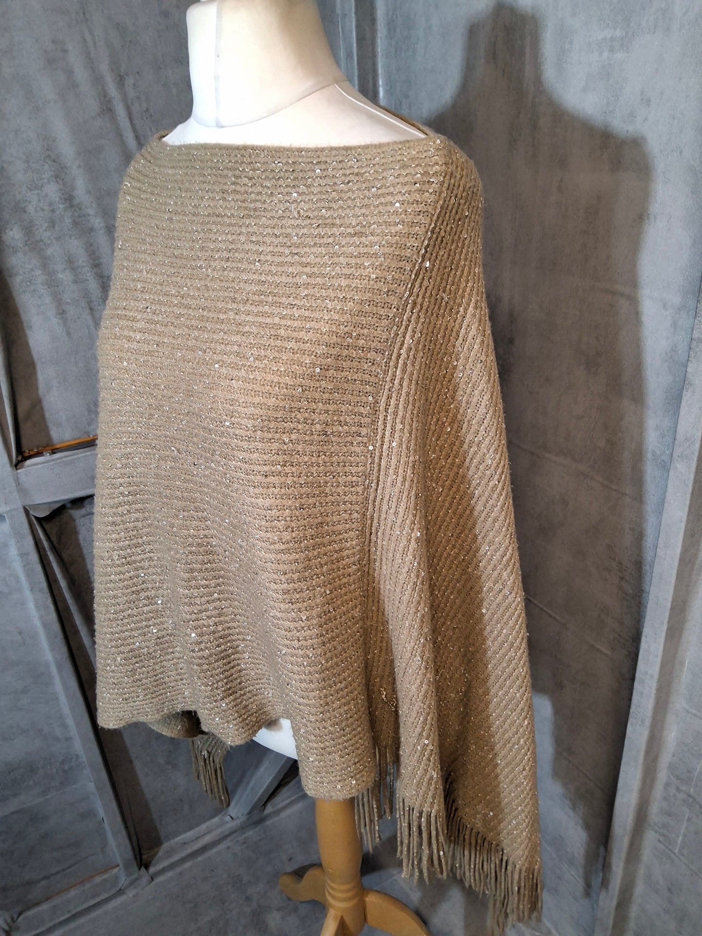Beige Knitted Sequin Poncho with Tassel Trim – One Size (Fits size 12–18)